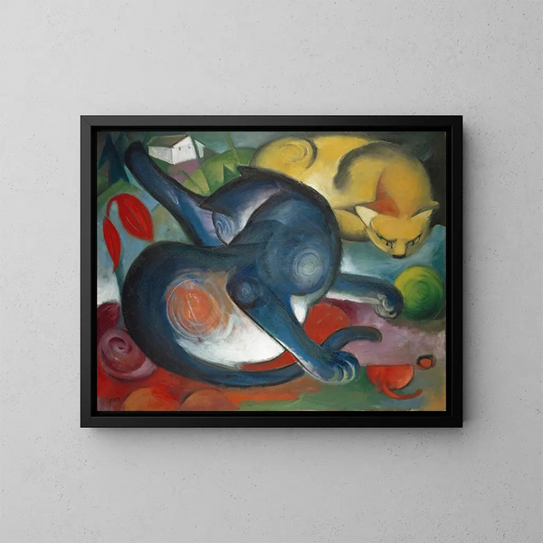 Two blue and yellow cats - Franz Marc — framed artwork on a wall