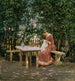 La mujer del artista en el árbol - Gerhard Munthe — vista de la obra