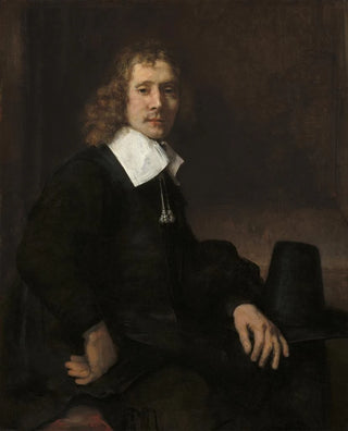Rembrandt van Rijn - A Young Man Seated at a Table possibly Govaert Flinck.webp