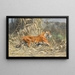 In the Jungle - Wilhelm Kuhnert — framed artwork on a wall