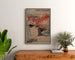 Póster vintage Bretaña – Playas de Bretaña, Orléans, enmarcado sobre una cómoda de madera, entre plantas.