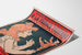 Vintage poster “À la France moderne, Lyon” on a curled sheet, shown in perspective.