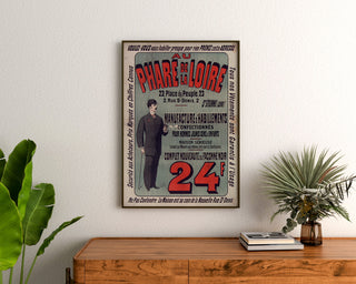 Vintage advertisement Au Phare de la Loire, clothing, poster framed above a wooden dresser between plants.