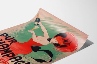 Póster publicitario vintage Champagne Damery-Épernay, presentado sobre una hoja curvada, visto en perspectiva.