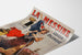 Vintage advertising poster La Messine, liqueur, shown on a curled sheet, perspective view.