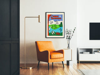 Vintage travel poster – L’Ain touristique, framed in a living room with an orange armchair and a floor lamp.