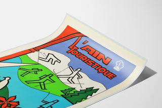 Vintage travel poster – L’Ain touristique, shown on a slightly curled sheet, seen in perspective.