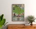 Vintage travel poster – Waterland, electric tram, framed above a wooden sideboard, between plants.