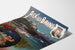 Vintage poster Aix‑les‑Bains, night festival, on a curled sheet, shown in perspective.