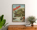 Vintage poster Aix‑les‑Bains, Mont‑Revard, rack railway, framed above a wooden dresser, flanked by plants.