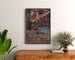 Vintage Arcachon poster, winter resort, framed above a wooden chest, between plants.