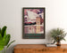 Vintage Font-Romeu winter sports poster, framed above a wooden dresser between plants.