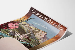 Vintage Lourdes Chemins de fer du Midi poster, presented on a curled sheet, seen in perspective.