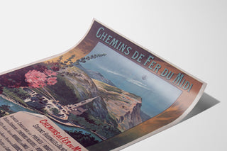 Póster vintage de Lourdes, estaciones balnearias, mostrado sobre una hoja curvada, visto en perspectiva.