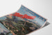 Vintage Mont-Revard poster, rack railway, shown on a curved sheet, seen in perspective.