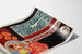 Vintage Nice poster, Travail et Joie, shown on a curved sheet, viewed in perspective.