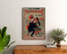 Vintage Nîmes poster, charity festivities, framed above a wooden chest, between plants.
