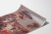 Vintage P.L.M. Hyères poster, shown on a curved sheet, viewed in perspective.