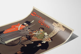 Cartel vintage Shamus O’Brien, Opera Comique, presentado sobre una hoja curvada, visto en perspectiva.
