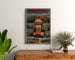 Cartel vintage Thonon-les-Bains, enmarcado sobre una cómoda de madera, entre plantas.