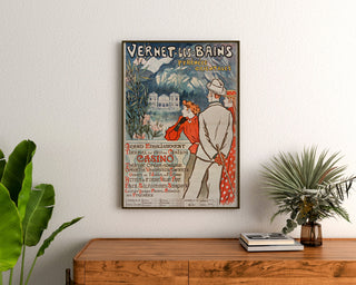 Vintage Vernet-les-Bains Canigou poster, framed above a wooden dresser, between plants.