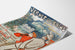 Vintage Vernet-les-Bains Canigou poster shown on a curved sheet, viewed in perspective.