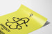 Minimalist yellow poster with symbolic drawing Amnesty for Halliker