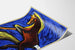 Vintage poster of a galloping horse on an intense blue background