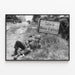 American paratrooper resting near Sainte-Mère-Église | Art print of historic photo — framed artwork on a wall