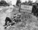 American paratrooper resting near Sainte-Mère-Église | Art print of historic photo — artwork view