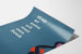 Blue Wall Poster 'Stap Er Eens Uit Met Een Boek' by Jan Bons